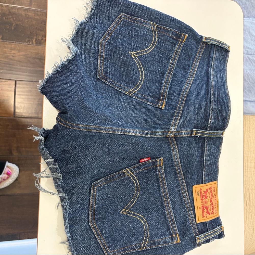 Levi’s 501 button fly denim shorts with frayed hem size 28